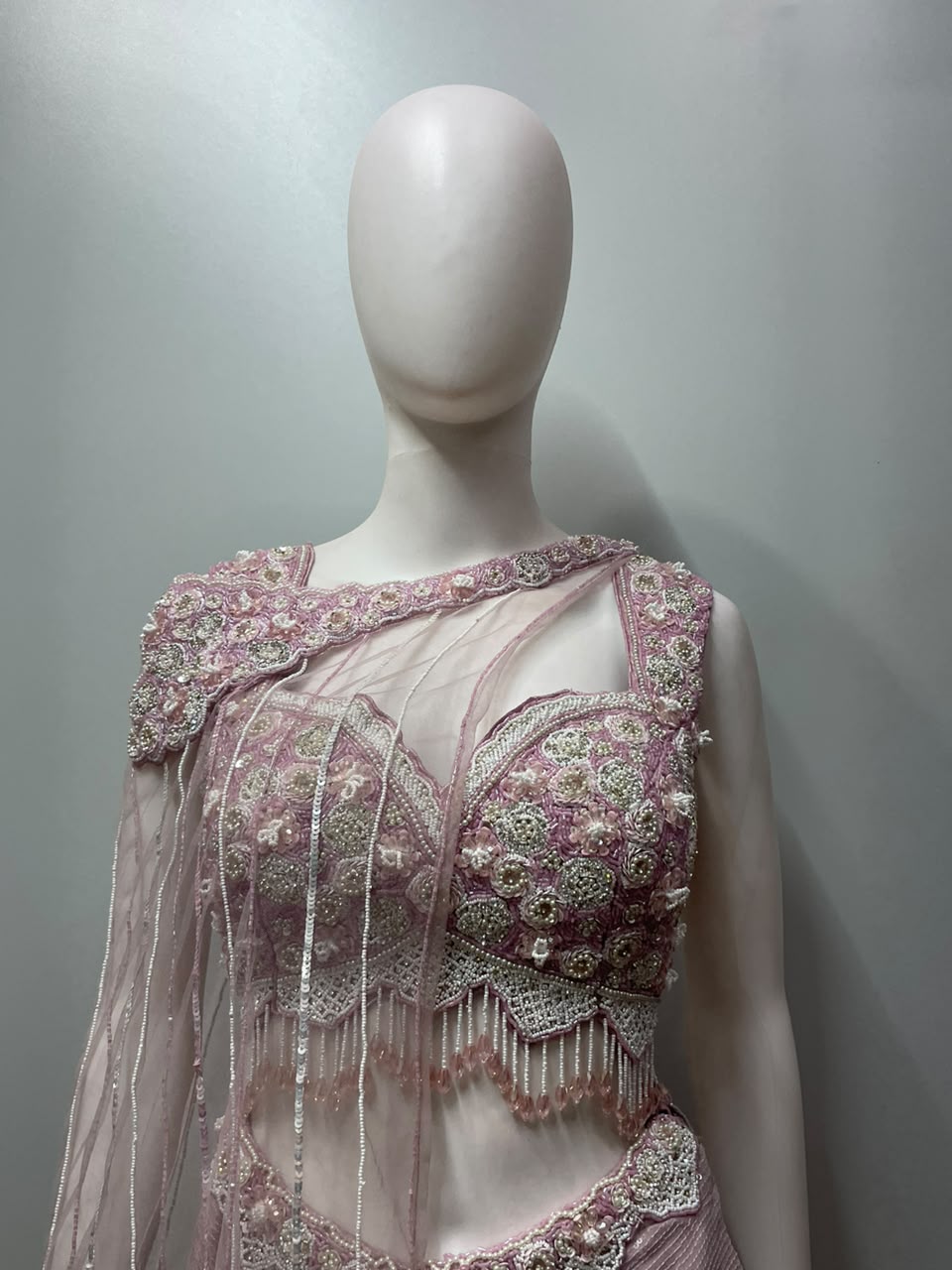 Lilac sequin draped skirt set styled for a wedding party evening