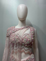 Lilac sequin draped skirt set styled for a wedding party evening