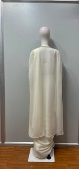 Ivory modern drape saree styled for an evening wedding celebration