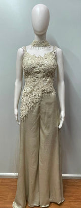 Full-length view of an ivory pearl embroidered cape ensemble