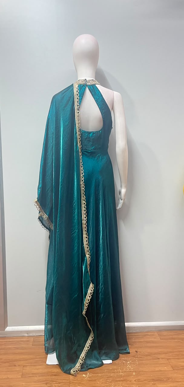 Detail of the flared hem on an emerald gold embroidered anarkali
