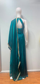 Detail of the flared hem on an emerald gold embroidered anarkali