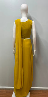 Detail of the blouse and pallu on a golden luxe draped saree set