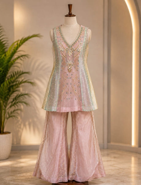 Soft multicolour pastel panels across the blush pink kurta