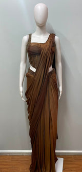 Back view of a copper bronze corset saree set and draped pallu