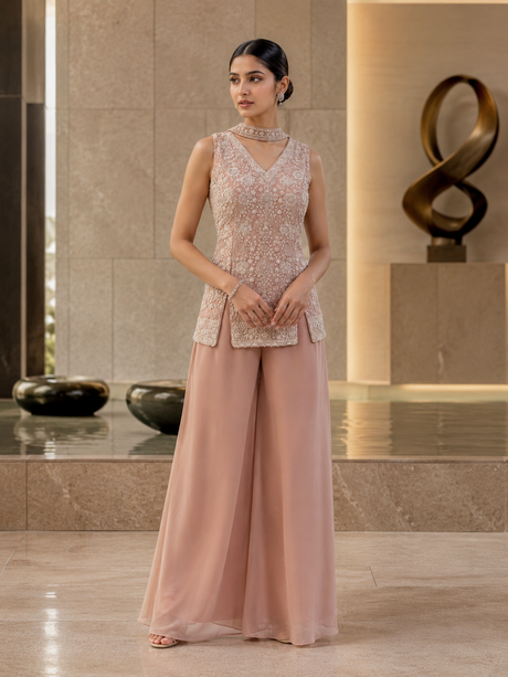 Dusty rose palazzo set with a pearl-beaded sleeveless top and wide-leg pants
