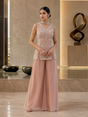 Dusty rose palazzo set with a pearl-beaded sleeveless top and wide-leg pants