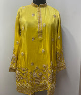 Chartreuse yellow kurta with gold peacock motifs, front view