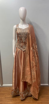 Peach gold jewel corset lehenga set, front view