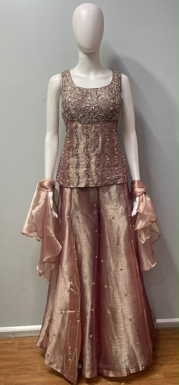 Sleeveless longline top in rose taupe with a squared beaded neckline