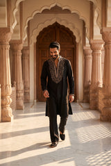 Full-length view of the midnight black regal kurta set with tailored black trousers