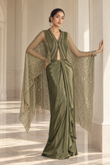 Olive sage cropped jacket top with a sequin sheer cape over a pre-draped floor-length skirt