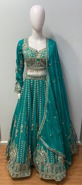 Asymmetric one-sleeve teal blouse with antique gold threadwork and embroidered waist panel