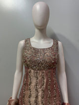 Symmetrical vine and paisley embellishment on the rose taupe longline top