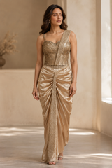 Champagne draped saree with crystal work and a fitted blouse