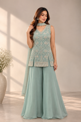 Aqua mint palazzo set with silver beadwork on a sleeveless V-neck top