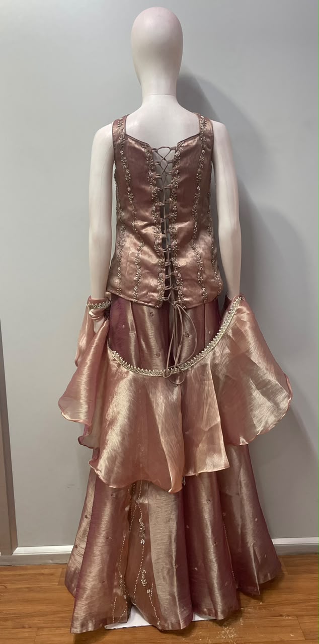 Wide-leg palazzo pants and tonal drape from the rose taupe set