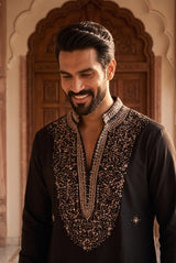 Geometric gold embroidery on the chest panel of the midnight black men's kurta