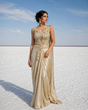 Champagne draped saree with applique work and a matching blouse