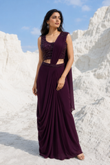Wine draped saree with sequin work and a matching fitted blouse