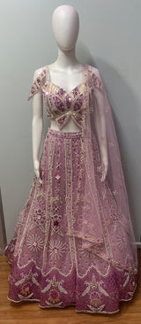 Sweetheart-neck blouse with silver pearl and sequin beadwork on the dusty mauve lehenga