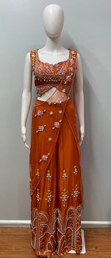 Detail of the neckline on a burnt orange crop top and palazzo set