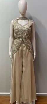 Floral sequin beadwork across the champagne gold peplum bodice