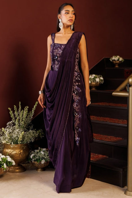 Deep plum draped saree gown with metallic floral embroidery on the bodice