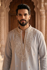 Full-length view of the pearl grey kurta set with full sleeves and matching trousers