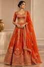 Copper orange lehenga set with antique gold jewel embroidery and matching dupatta