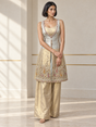 Ice white palazzo set with a layered neckline, jewel detailing and an ornate paisley hem