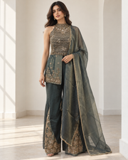 Smoky teal halter palazzo set with dense antique gold beadwork on the cropped high-neck top