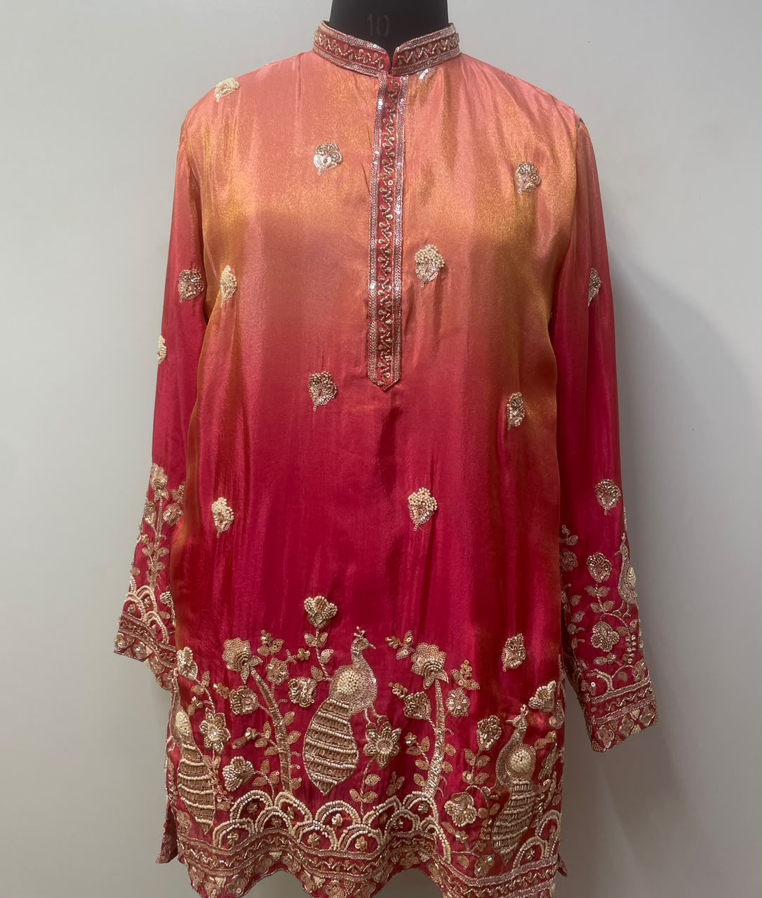 Coral crimson ombre kurta with gold peacock motifs, front view