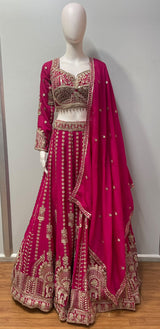 Asymmetric one-sleeve fuchsia blouse with antique gold beadwork and a maroon lower panel