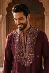 Full-length view of the deep burgundy regal kurta set with matching trousers