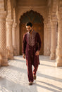 Deep burgundy men's kurta with a champagne gold beaded mandarin neckline