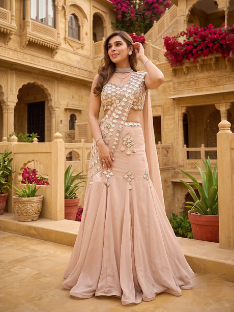 Champagne blush mermaid lehenga with three-dimensional silver petal work