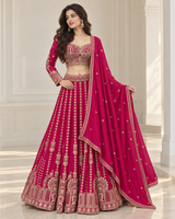 Fuchsia pink lehenga set with antique gold jewel embroidery and matching dupatta
