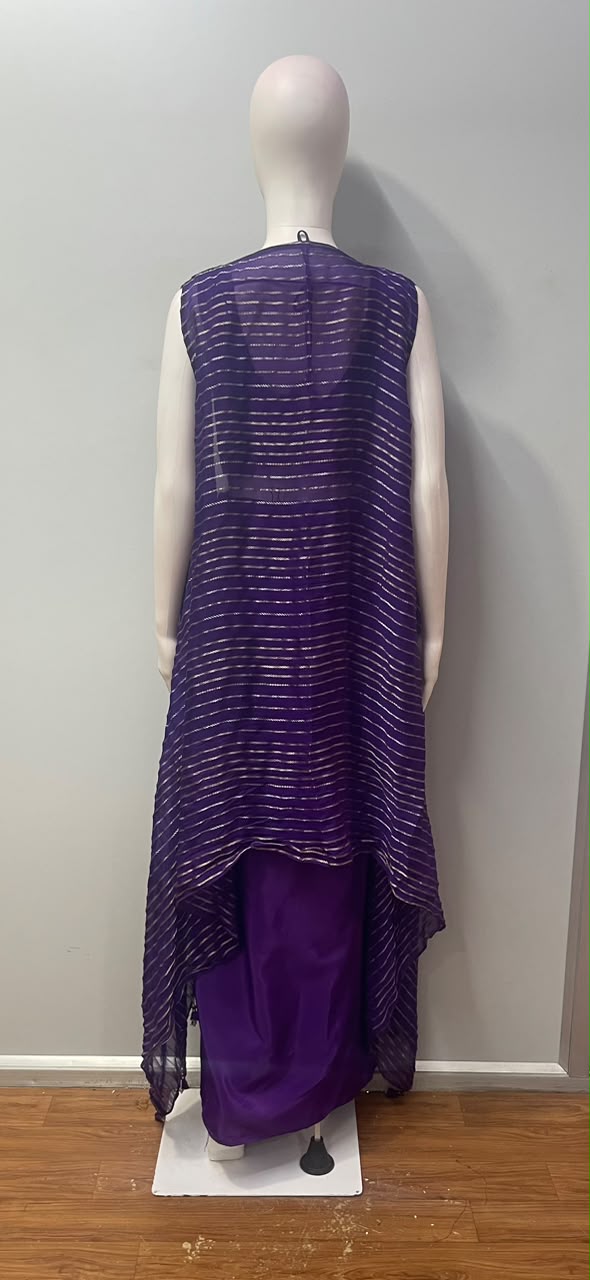 Sheer gold-striped dupatta styled with the royal amethyst set