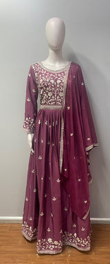 Botanical embroidery across the bodice of the dusty plum anarkali