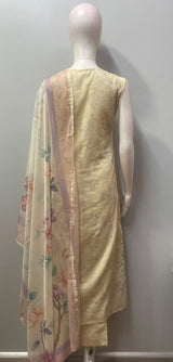 Lavender blossom embroidered ensemble photographed against a plain backdrop