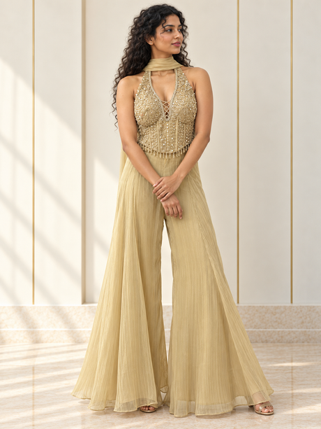 Champagne gold halter corset palazzo set with a lace-up neckline and textured trousers