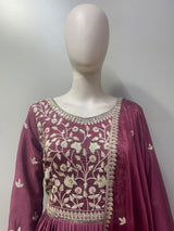 Floor-length flared silhouette of the dusty plum anarkali set