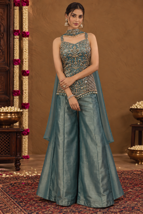 Deep teal palazzo set with an antique gold floral structured top and a sheer drape