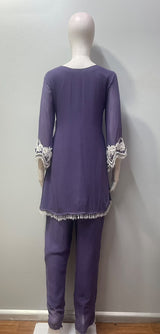Lavender kurta with white lace panels, worn with a sheer matching dupatta