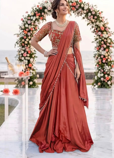 Terracotta pre-draped skirt set with gold floral blouse and shoulder drape