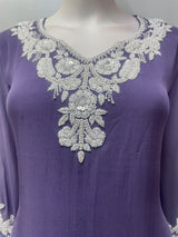 Side view of the lavender lace kurta showing the hem and trouser length