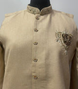 Champagne gold Nehru waistcoat kurta set with decorative buttons, front view