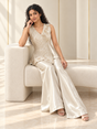Ivory champagne asymmetric floral top with scalloped hem and flared trousers
