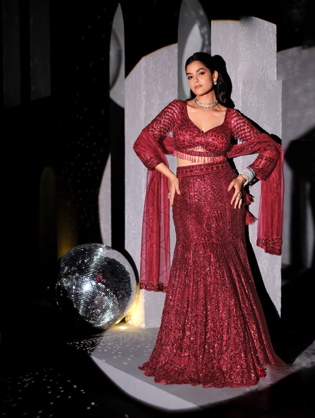 Deep wine mermaid lehenga with crystal fringe and tonal sequin work